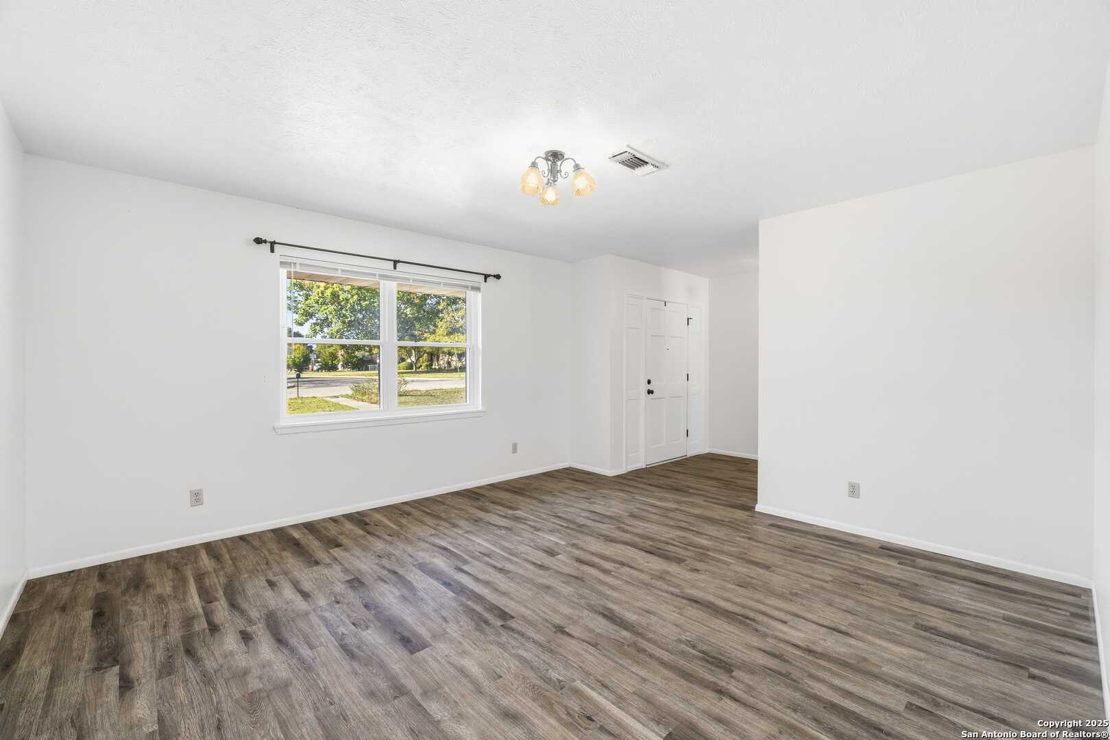 Large living room space upon entry.