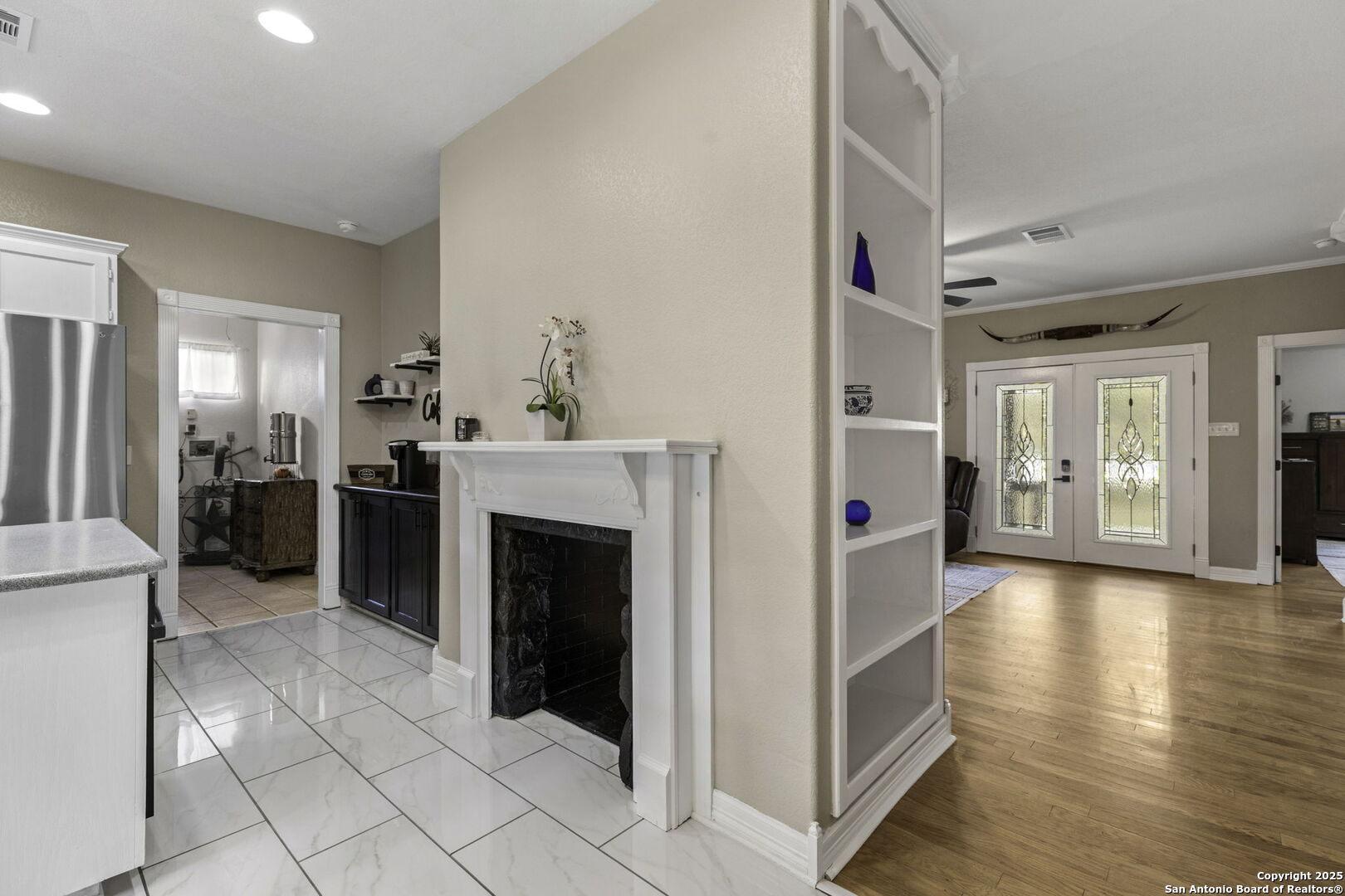Fireplace pass through to kitchen. Built ins!