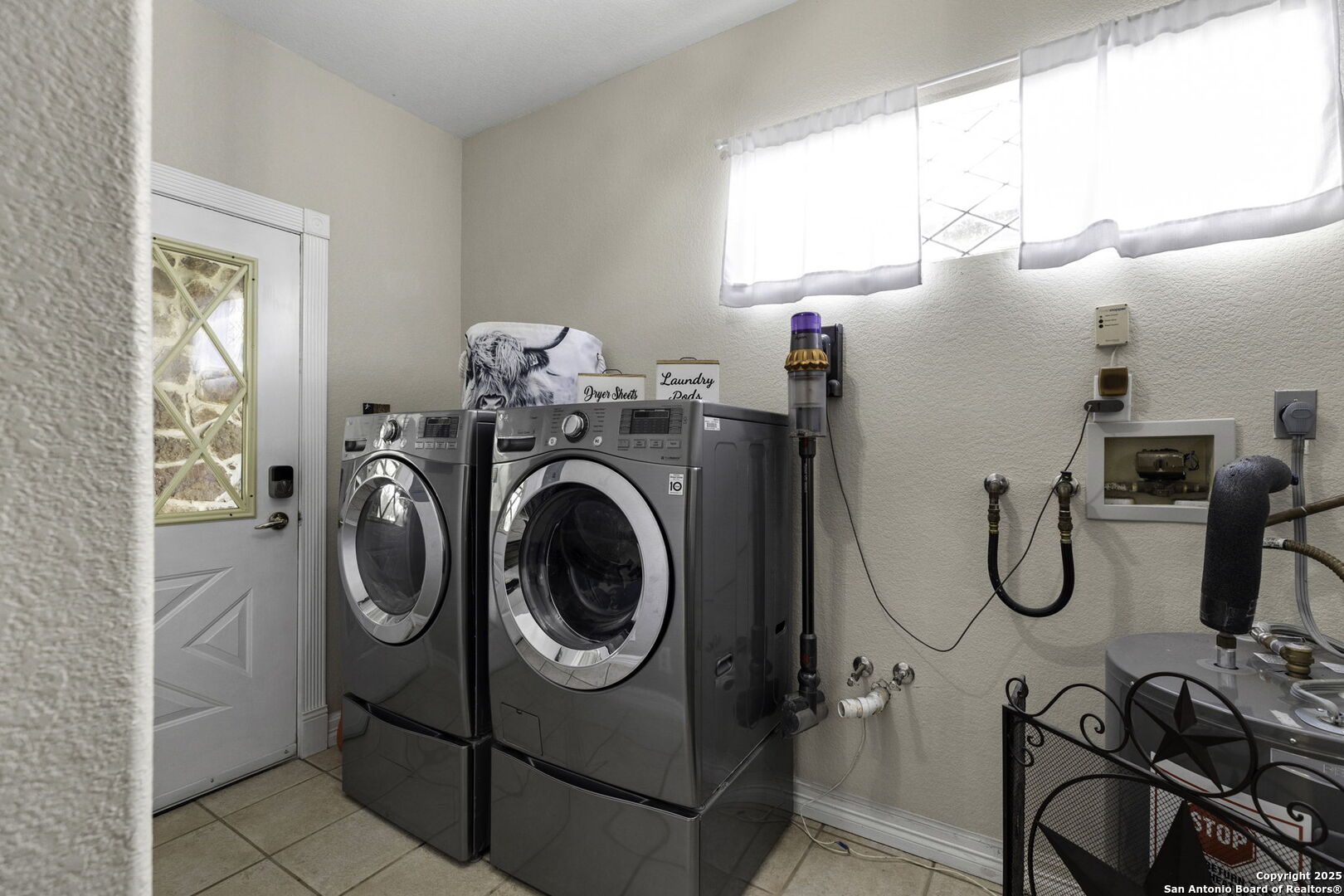 Utility room in main home.