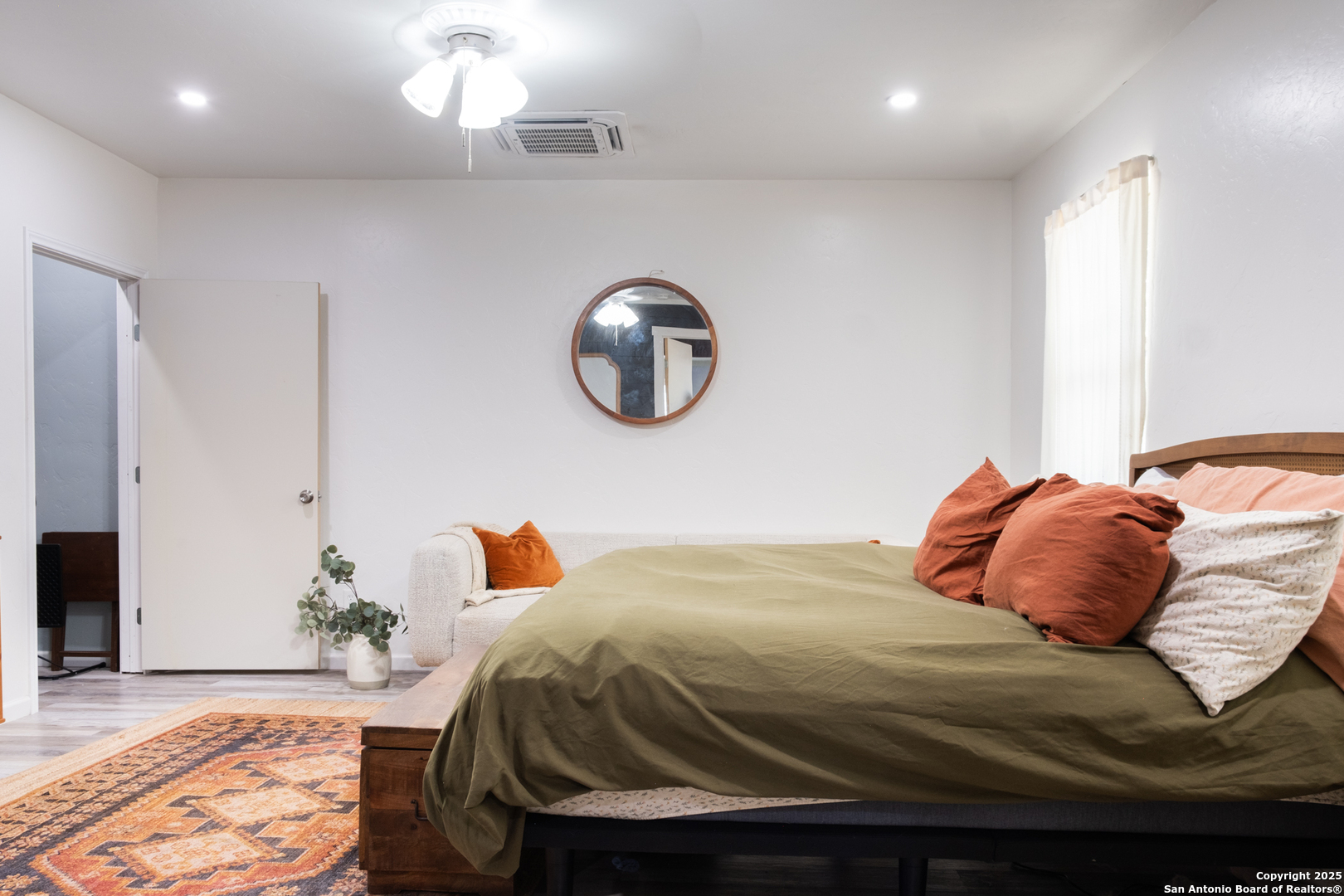 Large primary bedroom with walk-in closet
