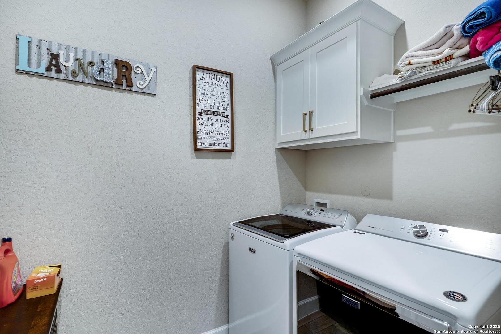 Large laundry w storage