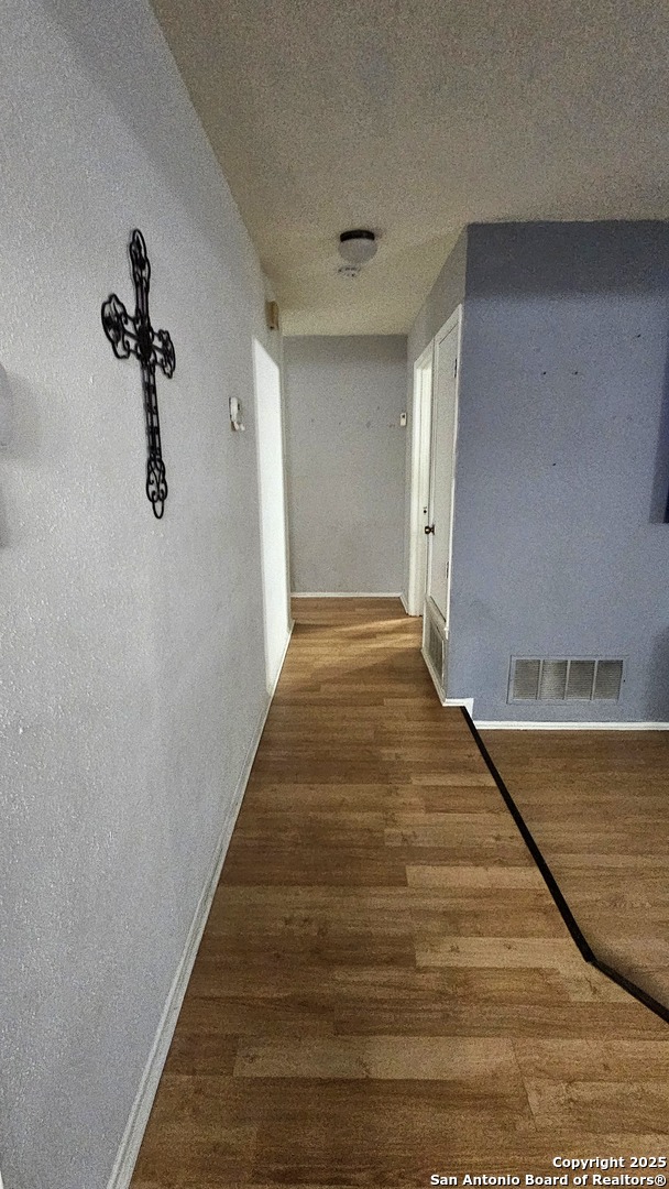 LIVING ROOM HALLWAY INTO THE ROOMS