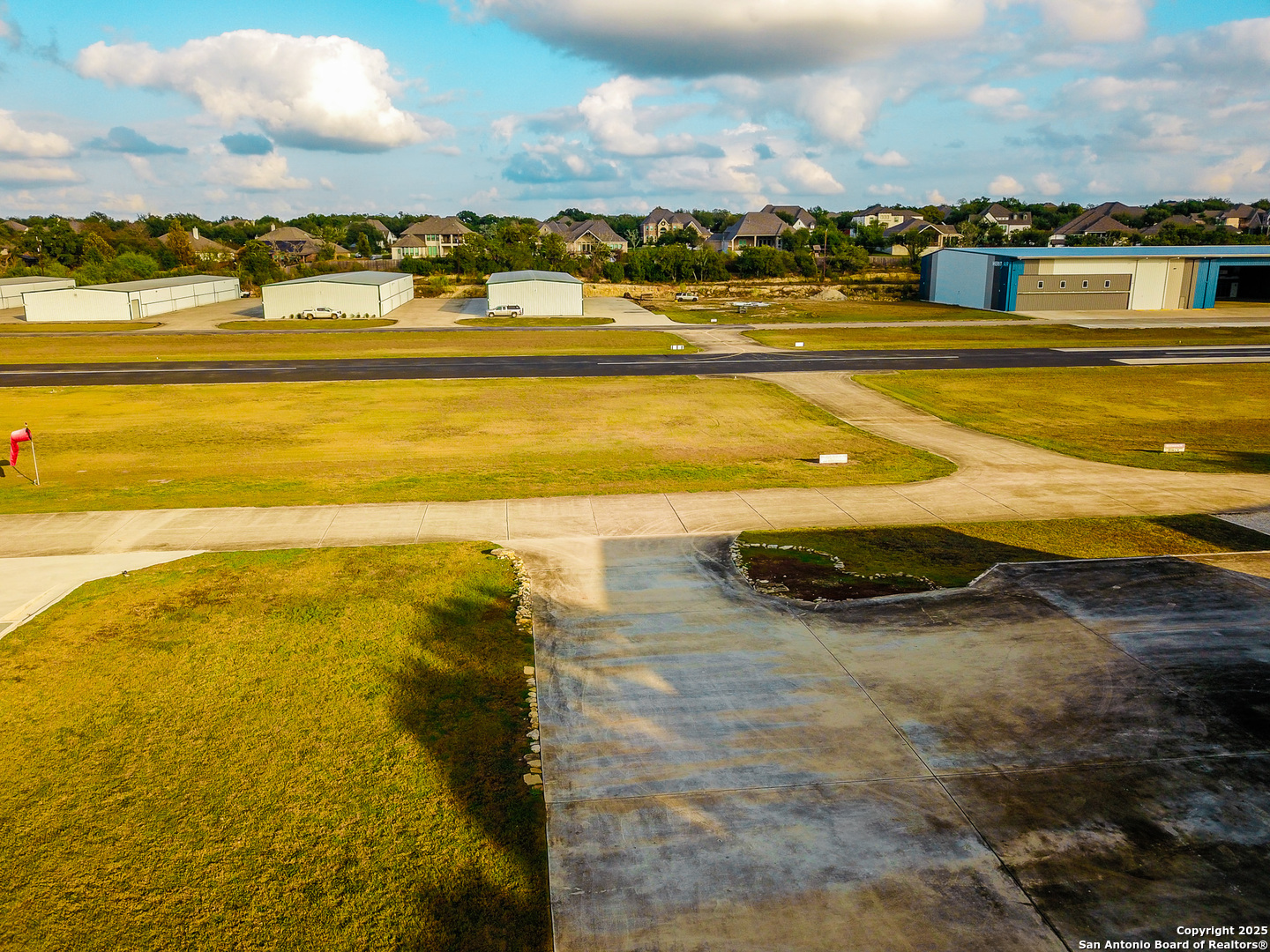 Runway facing from the home to the taxiway -runway