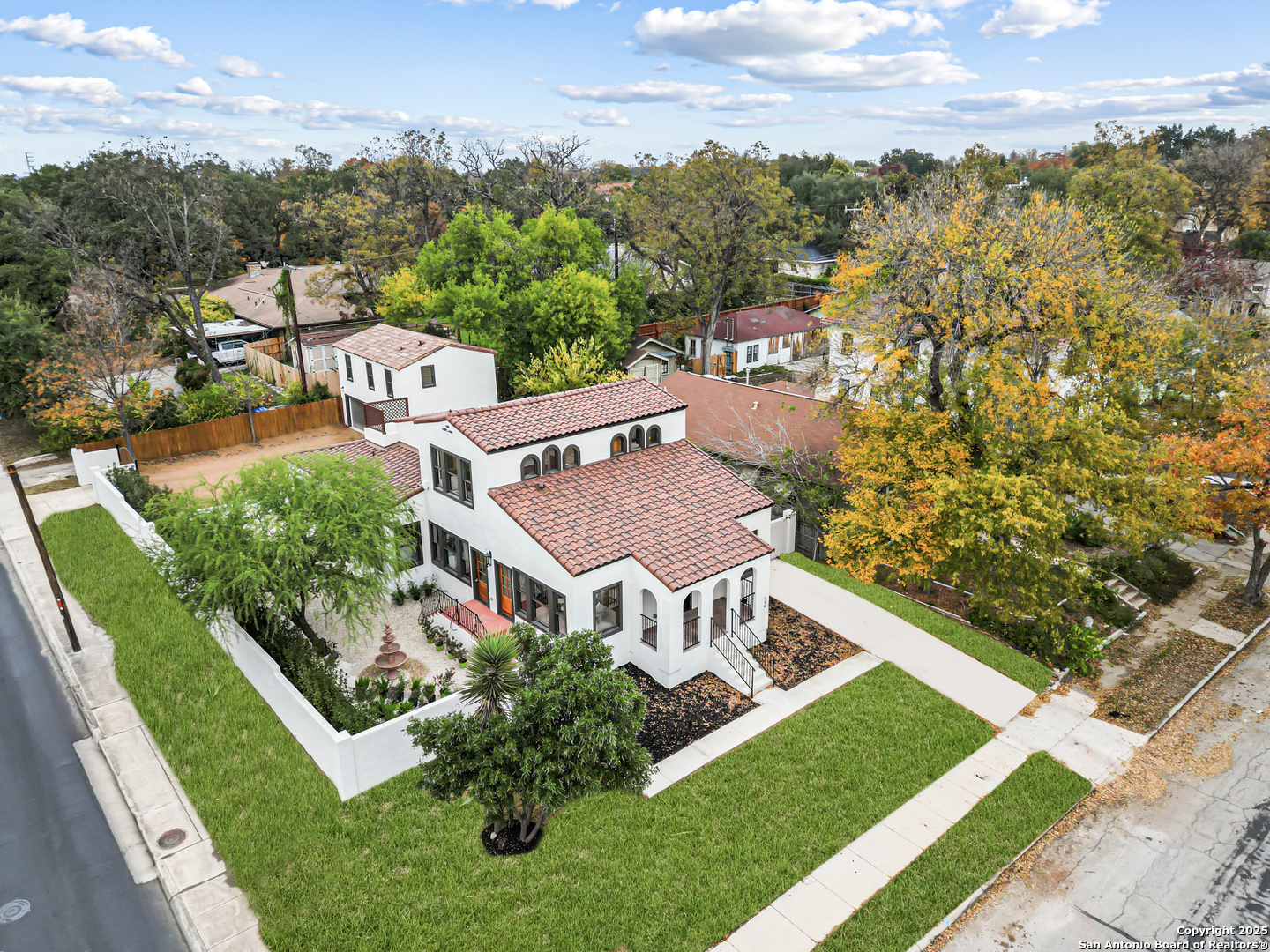 **OPEN HOUSE Sunday Dec. 21st 12-4pm**Step into timeless elegance in this beautifully remodeled Spanish-style residence, taken down to the studs and thoughtfully reimagined, nestled in the heart of historic Monte Vista. Designed with both character and comfort in mind, the home features a chef's kitchen with high-end finishes, refinished hardwood floors, vaulted ceilings with wood beams and windows that flood the living spaces with natural light. The main level offers two bedrooms and two full bathrooms, including a serene primary suite with a spacious walk-in closet and a stunning, spa-inspired bath. Upstairs, you'll find a generous game or flex space, an additional bedroom, and a full bathroom. High ceilings and light-filled interiors lead to a rooftop terrace, perfect for elevated entertaining. A detached garage apartment offers approximately 800 square feet and includes a full kitchen, living area, bedroom, and bathroom. The lower level features a large utility room with washer and dryer connections, presenting an excellent opportunity for an income-producing rental or guest quarters.  Enjoy San Antonio's year-round outdoor living with endless opportunities in the courtyard  ideal for gatherings, along with a detached two-car garage providing both convenience and storage. This exceptional home blends historic charm with modern amenities, offering a rare opportunity in one of San Antonio's most sought-after neighborhoods. Located just minutes from downtown, the Pearl, and iconic cultural landmarks, this property delivers the perfect balance of sophistication, flexibility, and lifestyle. Note** Main house is 2700 sq ft and garage apartment is 800 sq ft.
