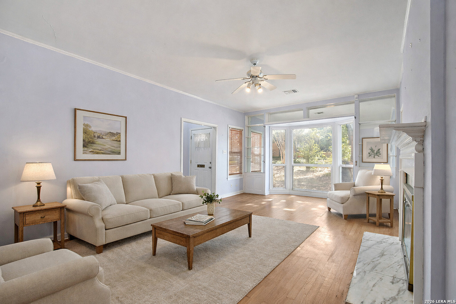 Nestled on an exceptional double lot in the heart of Mahncke Park, 507 Parland Place offers a rare blend of space, versatility, and prime location-directly across from the San Antonio Botanical Garden and moments from the San Antonio Country Club, Brackenridge Park, the Pearl District, Zoo, Airport, dining, shopping, and major cultural destinations.        Lovingly cared for over decades, the property is surrounded by mature trees thoughtfully planted by the owner, creating a peaceful, park-like setting rarely found this close to the city's core. From the primary bedroom, large windows frame tranquil views of greenery-an everyday retreat that has been treasured for generations.    The main residence features 1,963 square feet with solid wood and hardwood flooring, a wood-burning fireplace with a timeless mantel, and a spacious living room anchored by a large bay window overlooking the neighborhood. Built-in hutches, shelving, and display cabinetry add warmth, character, and thoughtful storage throughout. A kitchen addition expands the living space and offers excellent functionality with two sinks (filtered water), abundant natural light overlooking the large yard, an eat-in kitchen, generous pantry space with natural light, and flexible layout-ready to enjoy today or reimagine to suit your future vision. The primary suite includes an ensuite bath and two closets, while secondary bedrooms provide flexibility for guests, office, or creative use. A secondary bathroom features a large, jetted tub enhancing everyday comfort.        Adding exceptional value and flexibility is the detached two-car garage with private studio/casita, offering approximately 460 square feet of living space with a full bathroom and kitchenette. This versatile structure presents outstanding potential for multigenerational living, guest accommodations, private home office or studio, or income-generating use, subject to buyer verification of zoning and use requirements.        Set on approximately 1/3 of an acre, this double lot property stands out within Mahncke Park for its lot size, layout, and versatility. With a total of approximately 2,423 sq ft of living space this is a truly unique opportunity to own a property with both character and long-term upside in one of San Antonio's most desirable neighborhoods.    Eclectic in spirit and rich with history, 507 Parland Place invites buyers to see the potential, envision possibilities, and create something truly special-whether enjoyed as-is or thoughtfully reimagined for the next chapter.