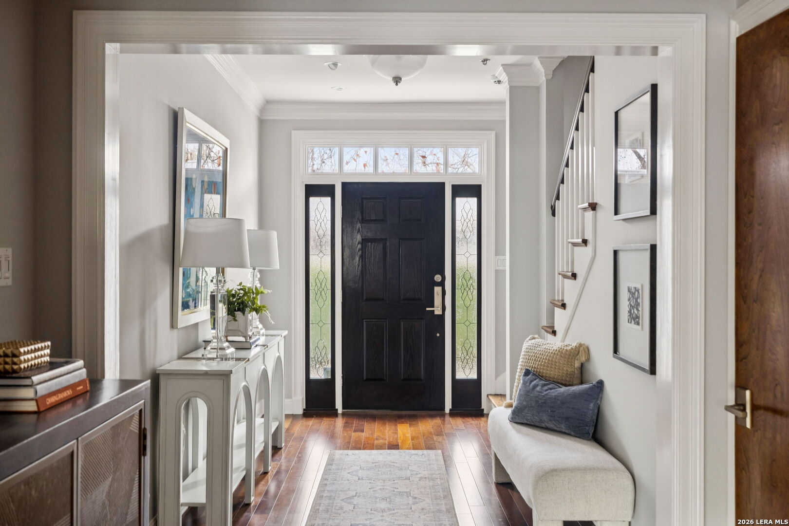 Looking for a "lock-and-leave" home in the heart of Alamo Heights? This is it! Completely updated from the inside out, the home features gleaming wood floors (no carpet) and thoughtful upgrades for peace of mind. The kitchen and wine bar showcase custom solid wood cabinetry, complemented by a spacious walk-in pantry. Stainless steel appliances include a Wolf gas range, oversized Dacor refrigerator, microwave drawer, wine fridge, and two generous prep sinks-perfect for cooking and entertaining. The light-filled living and dining area is anchored by a gas-log fireplace and built-in bookshelves, with a convenient guest powder bath on the main floor. Upstairs, the expansive primary suite offers room for a private sitting area. Its bath features dual vanities, soaking tub, and a newly updated walk-in shower. Walk past the utility area to either two guest bedrooms, or a living room/bedroom suite with a full bath. The third floor provides a versatile oversized game room or extra bedroom with full bath and walk-in closet. Behind the scenes, a few major updates include new exterior siding, CAT-5 wiring, water softener, reverse-osmosis system, and newer HVAC units. Outside, the private patio offers a gas cooking connection and low-maintenance landscaping-perfect for easy living. Enviably located steps from Central Market, SACC, Botanical Garden, UIW, and minutes from the Pearl, downtown San Antonio, Hwy 281, and the airport. Situated within the City of Alamo Heights, known for its private police and fire services, and surrounded by award-winning dining, shopping, and museums. Continue traveling the world without worrying about your home!