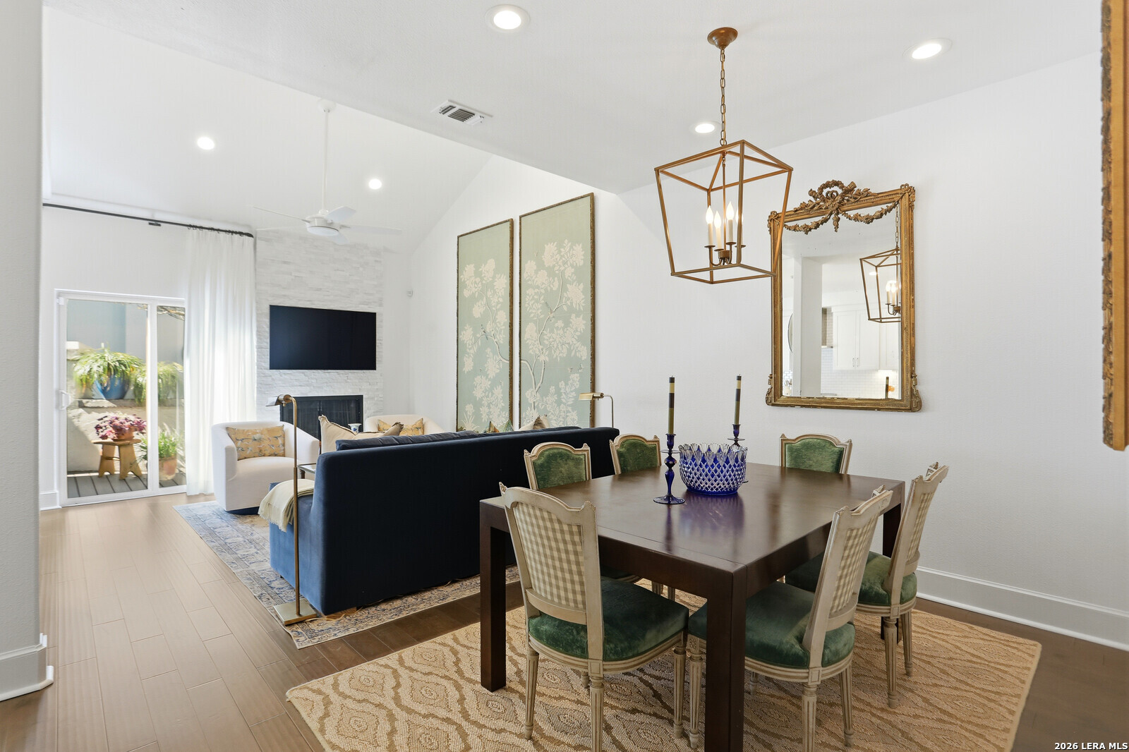 **** OPEN HOUSE SUNDAY 4/26/2026*****  Nestled along a shaded, quiet street in the highly sought-after Alamo Heights area, you'll find sophisticated townhome-style living with an elevated blend of comfort and modern luxury. From the moment you step inside, soaring high ceilings and rich engineered wood floors create an airy, refined ambiance that carries throughout the home. The thoughtfully designed kitchen is a true centerpiece, featuring a large island ideal for gathering and entertaining, complemented by abundant cabinetry, expansive counter space, and sleek stainless steel appliances. Whether preparing everyday meals or hosting guests, this space effortlessly balances style and functionality.     Natural light pours into the living room, highlighting the open-concept layout and creating a warm, inviting atmosphere. Seamlessly extending the living space, a private outdoor patio-accessible from both the kitchen and living room-offers the perfect retreat for morning coffee or evening relaxation.     Convenience meets elegance with a well-appointed half bath located on the main floor. Upstairs, the bedrooms provide a peaceful sanctuary, enhanced by privacy and comfort. The primary suite includes wood floors, vaulted ceiling, custom window coverings and a walk-in closet. The spa-like bath, with two skylights, marble countertops, dual sinks, custom lighting, and a walk-in shower, enhance the spa feel. The striking stairwell with large windows invites even more natural light, adding architectural interest and a bright, open feel.     Completing the home is an attached one-car garage along with a dedicated surface parking space, offering both practicality and ease. With its desirable location, refined finishes, and thoughtful design, this home represents an exceptional opportunity for upscale, low-maintenance living.      Ideally positioned moments from popular museums, the Pearl, and upscale shopping and dining, the location offers a lifestyle of culture and convenience