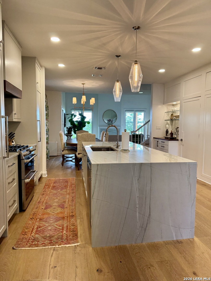 OPEN HOUSE SUNDAY 4/26, 1-3  Spectacular home with iconic Quarry views! Beautifully remodeled in 2023. Bright, open floor plan with family room + primary suite opening to nicely landscaped back yard for entertaining and beautiful sunsets. Chef's kitchen with an exquisite waterfall island, custom cabinetry, a built-in fridge/freezer, gas cooking, double ovens and breakfast nook. Bar close by for easy entertaining. Upstairs loft offers flex space plus two bedrooms and bull bath. Conveniently located with premier shopping and dining nearby.