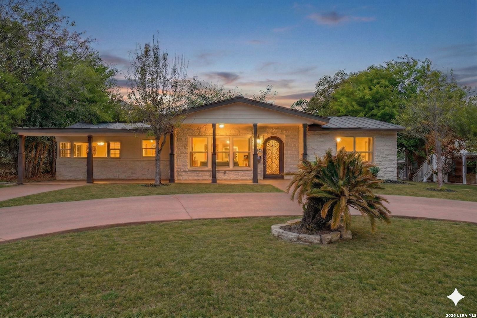 **OPEN HOUSE April 18th 11am-2pm, April 19th 12pm-3pm** Set in the prestigious community of Terrell Hills, just moments from Alamo Heights and adjacent to Fort Sam Houston, this thoughtfully updated single-story residence offers an exceptional opportunity to own in one of San Antonio's most sought-after locations. Positioned on an expansive, private 0.277-acre lot, the home blends classic character with modern updates across a functional and inviting layout. Natural light fills the living spaces, complemented by warm wood flooring and a seamless flow into the updated kitchen, complete with granite countertops, a gas range, farmhouse sink, and upgraded appliances. The flexible four bedroom configuration allows for a variety of living arrangements, whether accommodating guests, creating a dedicated office, or tailoring the space to your lifestyle. The primary suite offers a quiet retreat with direct access to the outdoor living area, enhancing the home's connection to its spacious surroundings.  Outdoors, the oversized lot provides both privacy and potential. A detached two-car garage presents an excellent opportunity for a workshop, studio, or future ADU conversion, adding long-term versatility and value. With major system updates including a recently replaced HVAC and a newer metal roof, this home offers a solid foundation for both immediate enjoyment and future customization. A rare offering in an established, high-demand neighborhood, this property delivers the ideal combination of location, flexibility, and upside potential.