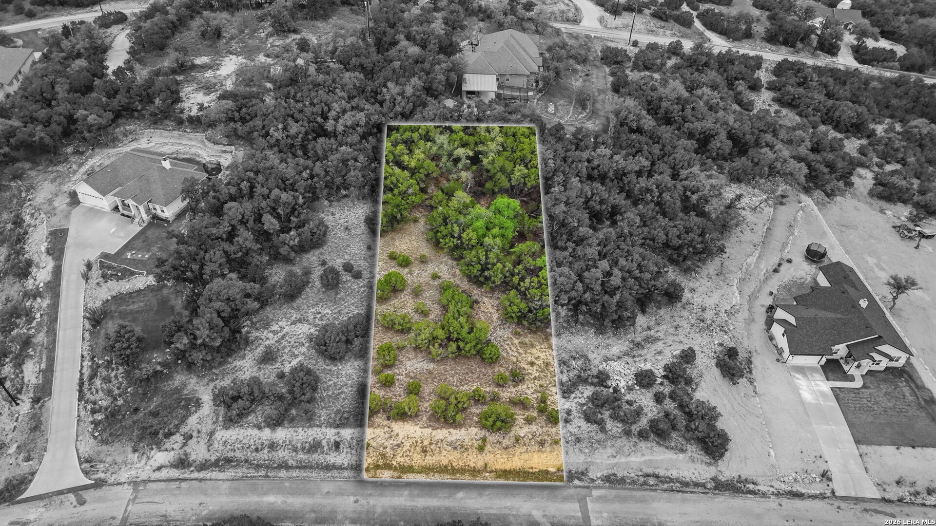 Perched atop a scenic hill in a gated Canyon Lake community, this 0.51-acre homesite offers something truly special, panoramic Hill Country views in every direction. This is the kind of property that immediately stands out, giving you the opportunity to design and build a custom home that fully captures the surrounding landscape. The elevated setting not only enhances the views but also provides a sense of privacy and presence that's hard to find. Located within a gated community, you'll enjoy added security, neighborhood consistency, and long-term value. Ideal for both personal enjoyment and investment. Positioned in the heart of the Texas Hill Country, this property offers the perfect balance of accessibility and escape. Conveniently located between Austin and San Antonio, you're close enough for an easy commute while still enjoying the peace and quiet that makes Canyon Lake so desirable. Nearby towns like New Braunfels, Fischer, and Wimberley offer local charm, dining, and entertainment just minutes away.  Outdoor enthusiasts will appreciate the proximity to Canyon Lake and surrounding parks, with endless opportunities for boating, fishing, hiking, and exploring the natural beauty of the area. Whether you're ready to build now or planning for the future, this is a rare opportunity to secure a premium hilltop lot in one of Canyon Lake's most desirable settings. Schedule a showing and come experience the views for yourself.
