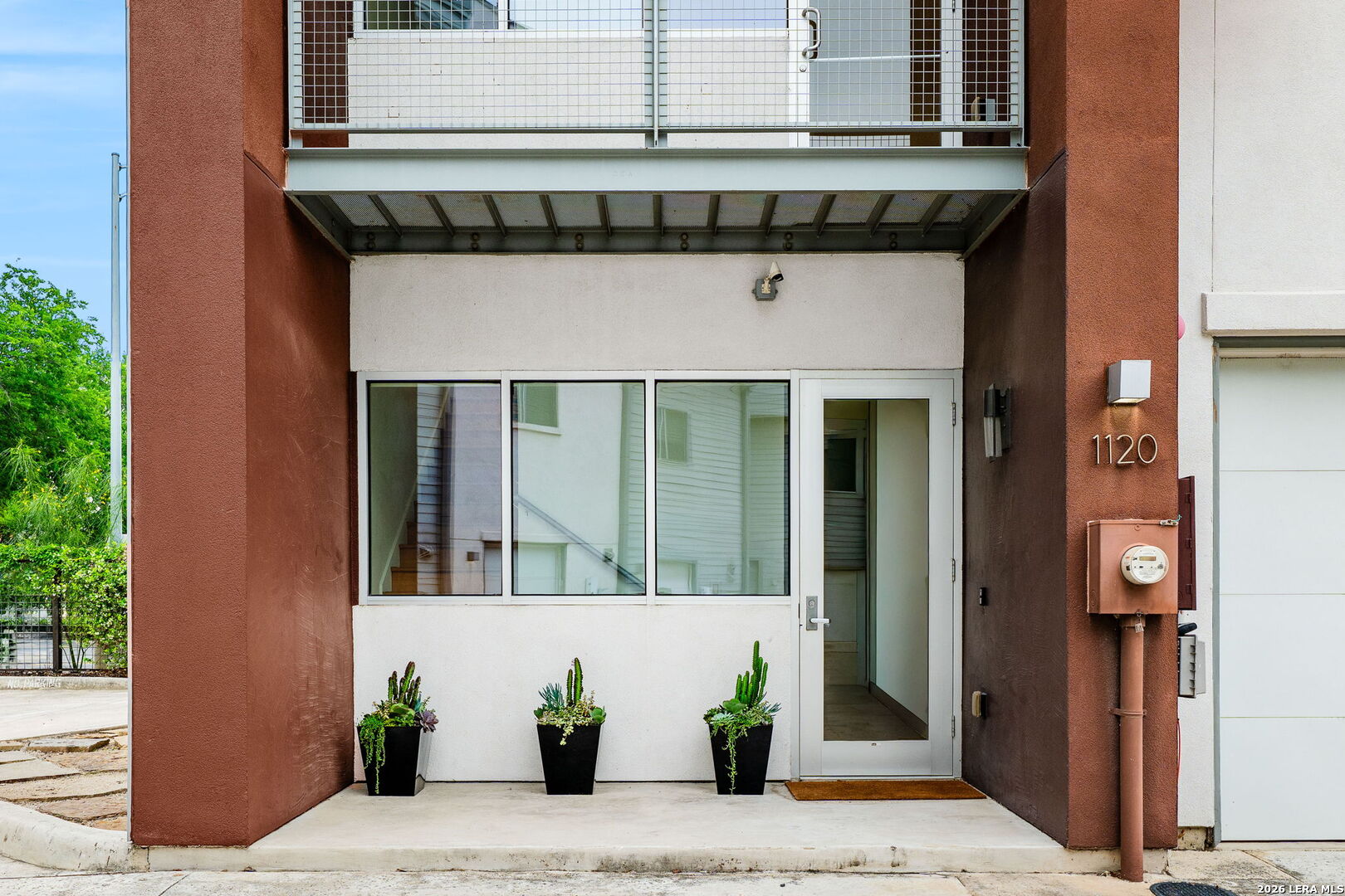 Modern, sophisticated 3 bedroom, 3 bath townhome steps from The San Antonio Riverwalk and The Pearl. This home is part of the intimate 25-unit East Quincy Townhomes. Take your daily exercise on the River or through the Pearl. The first floor includes a bedroom or study with full bath with access to the fenced and gated backyard. Stairs to the second level lead to a modern, beautiful island kitchen with Bosch appliances, quartzite counters, gas cooking, walk-in pantry and abundant cabinet storage. The kitchen opens up to the living room for seamless entertaining and includes a balcony. 14' ceilings, expansive windows and gorgeous hardwood flooring throughout. The third level includes two bedrooms with walk-in California closets and two modern, designer baths (the primary bath includes dual vanities). The icing on the cake is the rooftop balcony (only 5 units have this feature) for incredible city and night sky viewing. Home includes an attached one-car garage with storage and option for additional one-car carport, all securely gated. Incredible San Antonio living at a very reasonable price!  Otto's Icehouse and the Pullman Market is right across the street and the entrance to the Riverwalk is right outside the gate. HOA is only $65/mo. Enjoy a wide variety of activities at The Pearl including the Farmer's Market, Yoga Under the Stars, Music Classes, Children's Storytime, Concerts, Salsa Lessons, Monday Night Movies as well as award-winning dining, shopping and entertainment.  Don't miss the unique opportunity to be a part of this very special San Antonio community.