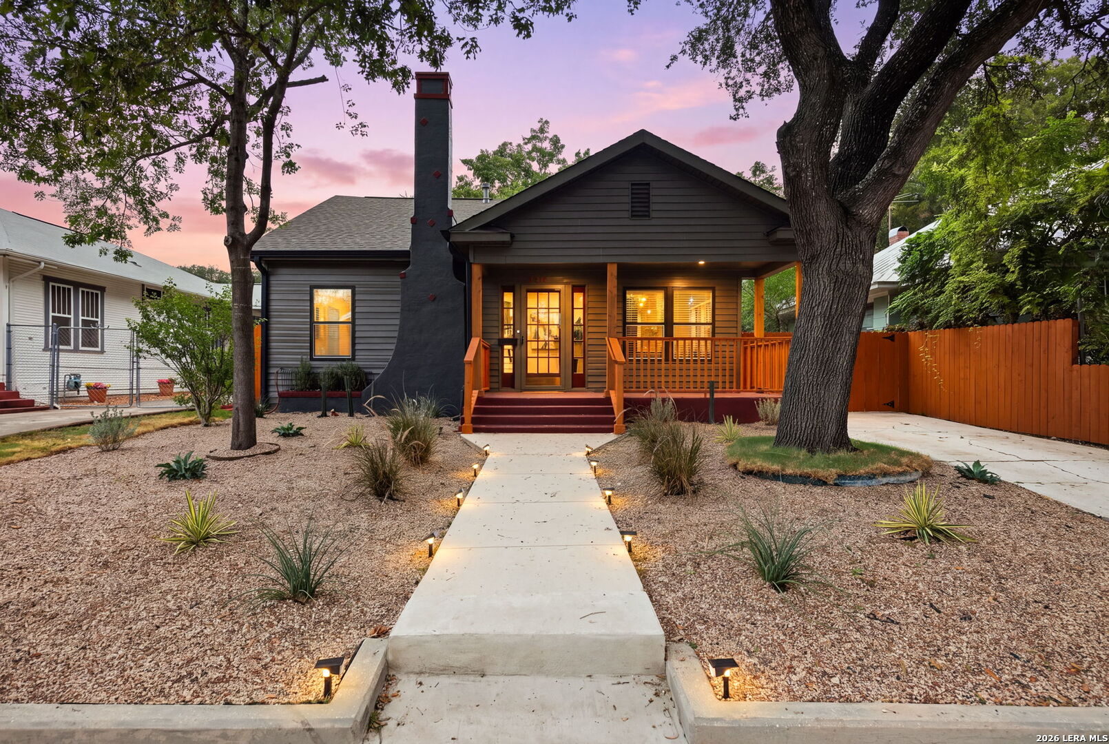 *Open House Saturday (10/31) from 11AM-4PM!* Set in the heart of historic Tobin Hill, 315 East Craig Place pairs authentic San Antonio character with the comfort of a complete down-to-the-studs renovation. This beautifully updated 4-bedroom, 3-full-bath home, showcases wood floors, an original fireplace and mantel, new insulation, wiring, and plumbing, fresh paint, a tankless water heater, and a thoughtfully designed chef's kitchen. Every bathroom is finished with bespoke tile, and an original stained-glass window in the dining area adds a touch of historic charm. The 4th bedroom is staged as an office, letting you imagine the duality of the space. The utility room offers space for a full-size washer and dryer along with a built-in dog-washing station, and an EV charger adds everyday convenience for electric vehicle owners. Heritage oaks shade the front yard, while the generous front porch invites you to unwind and enjoy the neighborhood. Just one mile from The Pearl and half a mile from the St. Mary's Strip, this home keeps some of the city's best restaurants, shopping, coffee shops, entertainment, and nightlife close at hand, and San Antonio International Airport is only about 7 miles away. Move-in ready and ideal for a lock-and-leave lifestyle, 315 East Craig Place is a rare opportunity for buyers seeking a fully renovated historic home in San Antonio, a Tobin Hill home near The Pearl, or walkable urban living in one of the city's most desirable historic districts.