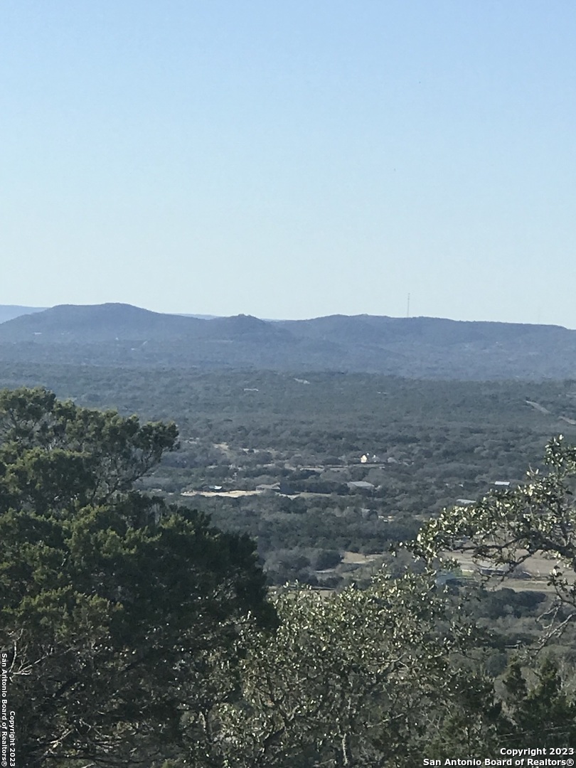 Sought after 5 acre ranch style Texas hill country location just minutes from Boerne, Texas. Gorgeous rolling landscape in a private gated community with common sense restrictions. Incredible views, waterfront community park on the creek and a herd of exotic elk and wildlife (with Ag exemption) to enjoy. Just minutes from historic Boerne with lots of fun activities for the family, main street shops and breweries and Tapatio Springs Resort and Golf Club.  Less than 30 minutes from The Rim, La Canterra , Fiesta Texas and nearby